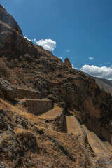 Archaeological site of Ollantaytambo, view of the terraces of the Real Casa del Sol with the mountains in the background, in Peru. 