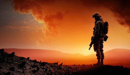 a lone soldiers silhouetted agains a fiery orange sunset