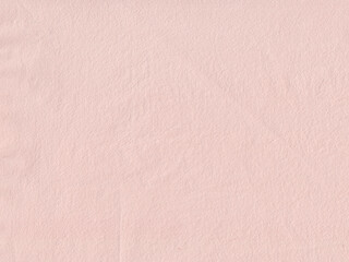 Handmade pink paper with paper structure. Meant as background.
