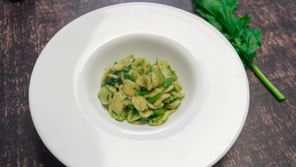 Typical dish of Italian cuisine, orecchiette with turnip greens. Orecchiette with cime di rapa
