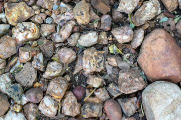 Rocks of varying sizes and shapes in an image for background use