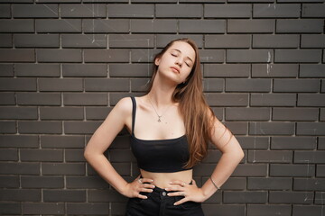Fototapeta na wymiar Stylish female teenager, Portrait of millennial young woman outdoors