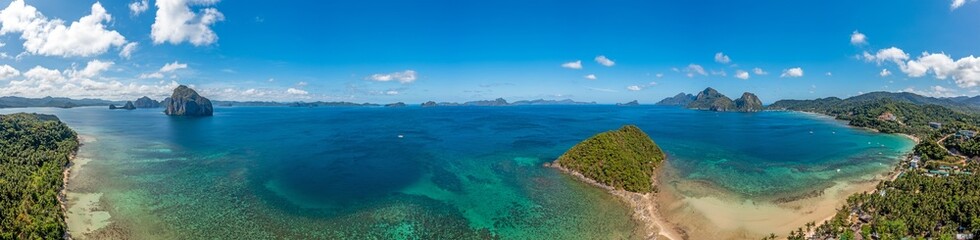 Drone panorama of the paradisiacal Maremegmeg beach near El Nido on the Philippine island of...