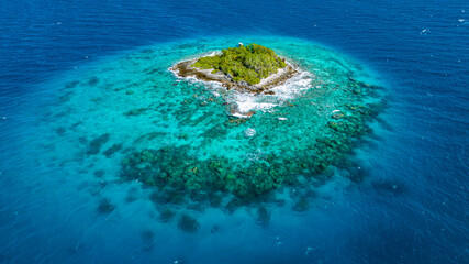 Aerial of a small island in the lagoon of the Rangiroa atoll, Tuamotus, French Polynesia, South Pacific