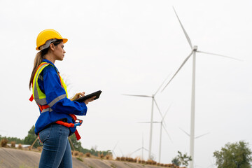 Wind turbine service engineer maintenance and plan for inspection at construction site, renewable...