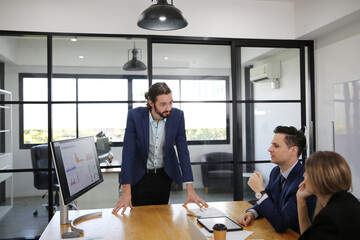 Business discussions. Shot of business people discussing and  brainstorming in an office