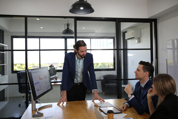 Business discussions. Shot of business people discussing and  brainstorming in an office
