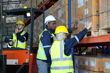 Man forklift driver working in a warehouse.