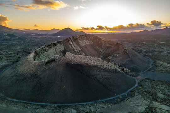 Aerial view of El Cuervo Volcano at sunset, Timanfaya National Park, Lanzarote, Las Palmas