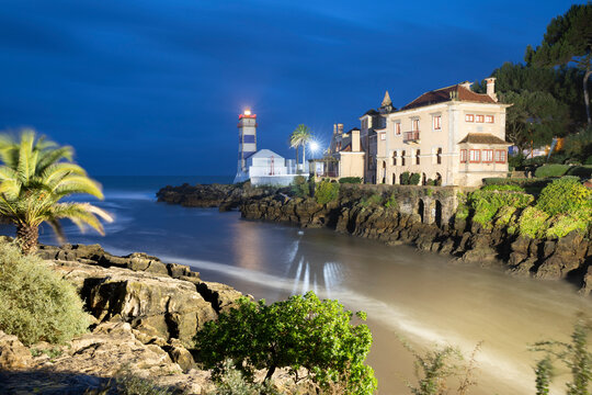 Santa Marta Lighthouse Museum and Casa Museu de Santa Maria floodlit at dawn, Cascais, Lisbon Region, Portugal
