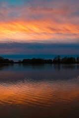 Sunset with reflections near Plattling, Isar, Bavaria, Germany