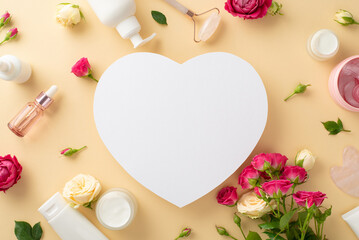 Skin care cosmetology concept. Stylish top view flat lay of face cream bottle, serum, and massage roller with rose flowers on a pastel beige background and an empty heart for copyspace or advert