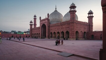 Timelapse view of historic landmark Badshahi Mosque, built in the 16th-century in the outskirts of the Walled City of Lahore, Punjab, Pakistan.