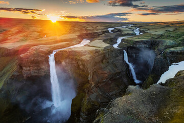 Majestic of Haifoss waterfall flowing on volcanic canyon among Icelandic Highlands in summer at Iceland