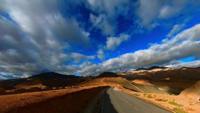 Driving through the Scenic Himalayan Mountains on a Sunny Morning