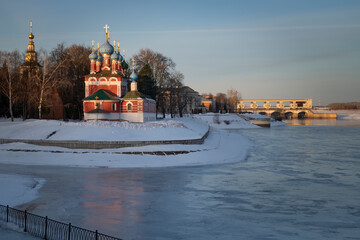 Dmitry on the blood church and hydroelectric power station at dawn