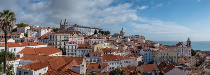 Naklejka na ściany i meble Panoramic view of the Lisbon old town in Alfama district in Lisbon, Portugal