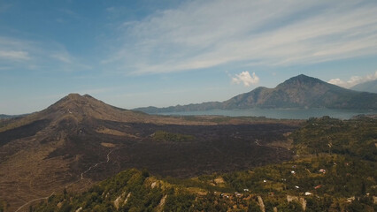 Aerial view of Mount Batur Volcano in Kintamani. Bali volcano, also referred to as Kintamani is popular sightseeing destination in Bali. Travel concept.