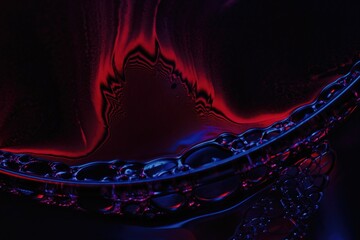 Beautiful psychedelic abstraction formed by light on the surface of a soap