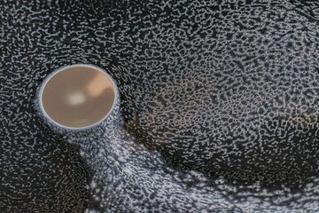 Beautiful psychedelic abstraction formed by light on the surface of a soap
