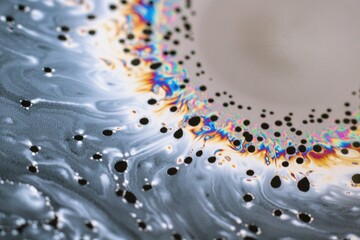Beautiful psychedelic abstraction formed by light on the surface of a soap
