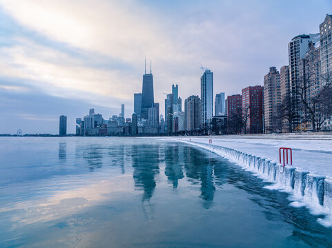 City skyline with Sears Tower and reflections in Lake Michigan, Chicago, Illinois, USA