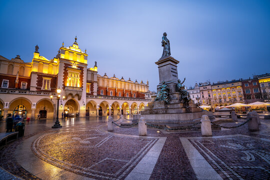 The Cloth Hall (Sukiennice) and the Adam Mickiewicz Monument at Dusk, Krakow Poland