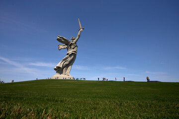 The Motherland Calls monument in Mamayev Hill War Memorial at sunset in Volgograd city, Russia. Clear blue sky. It is the tallest statue in Europe. Russian culture theme.