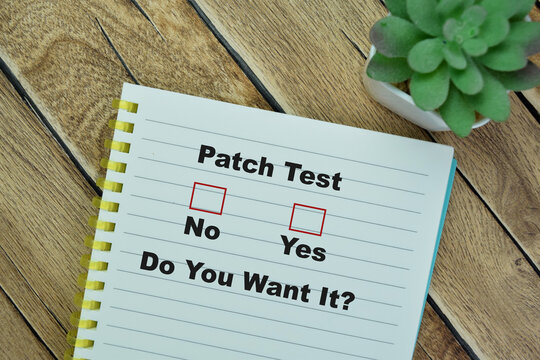 Concept of Patch Test. Do You Want it? Yes or No write on book isolated on Wooden Table.