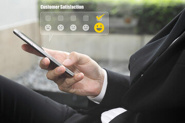 Businessman Using a Phone Giving Excellent Customer Service Rating For Customer Satisfaction Online Survey