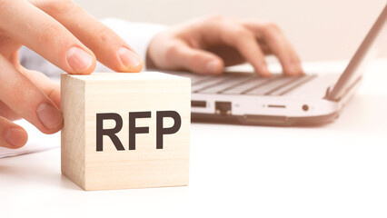 RFP text wooden block on white table background. Idea, strategy, advertising, marketing, keyword...