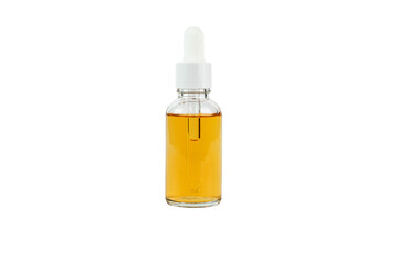 A dropper bottle with yellow vitamin C serum or oil standing on a white background. An isolated item