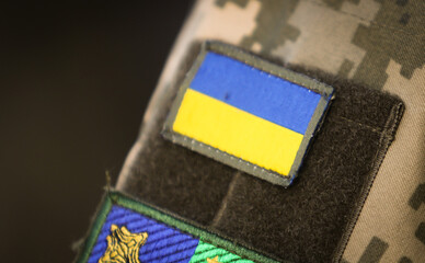 The flag of Ukraine on the uniform of the Ukrainian military