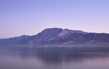 mountain in bay at sunrise