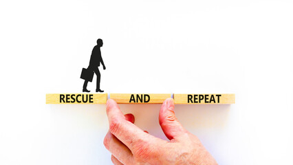 Rescue and repeat symbol. Concept words Rescue and repeat on wooden block on a beautiful white...