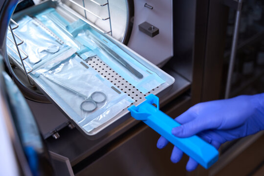Cropped photo the process of sterilizing medical instruments in an autoclave