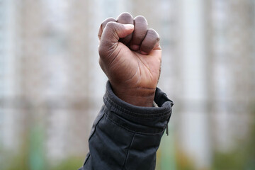 Raised black man fist in protest