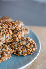 Vegan cookies made of banana and different seeds, photographed with natural light