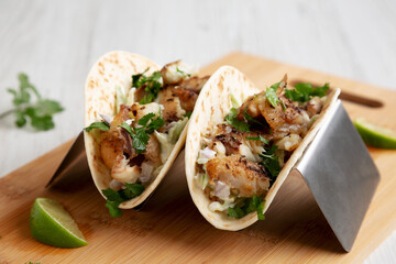 Homemade Fresh Fish Tacos, side view. Close-up.