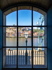 View on river Douro through window in Alfandega conference center in Porto, Portugal.