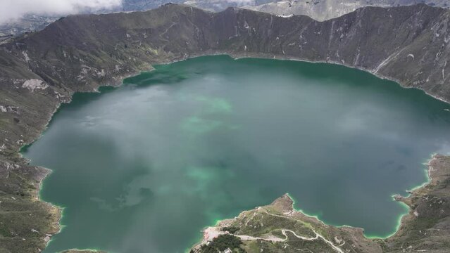 Aerial Quilotoa water-filled crater volcano lake  in the Ecuadorian Andes Mountains Mavic 3 cine drone 25fps prores  Timelapse 