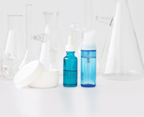 skin serum, moisturizing and whitening serum, fruit acids.Glass Volumetric Flask  ,Laboratory Flasksare used for  laboratory work  in the background