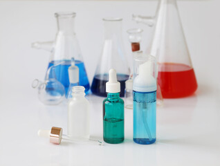 skin serum, moisturizing and whitening serum, fruit acids.Glass Volumetric Flask  ,Laboratory Flasksare used for  laboratory work  in the background