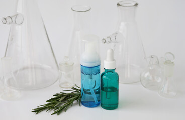 skin serum, moisturizing and whitening serum, fruit acids.Glass Volumetric Flask  ,Laboratory Flasksare used for  laboratory work  in the background