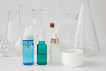 skin serum, moisturizing and whitening serum, fruit acids.Glass Volumetric Flask  ,Laboratory Flasksare used for  laboratory work  in the background
