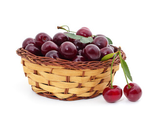 Red ripe cherries in the basket.