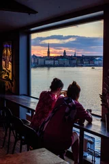 Fotobehang A view of Stockholm from the museum window © Ordasi  Tatyjana