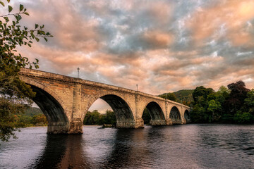 Fototapeta na wymiar Bridge over the River Tay at dusk, Dunkeld, Perthshire North, Scotland