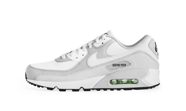 Istanbul, Turkey - April 12, 2023: Nike Air Max 90 GTX model shoes on white background. White and Gray color GORE-TEX shoes. Clipping Path. Isolated.