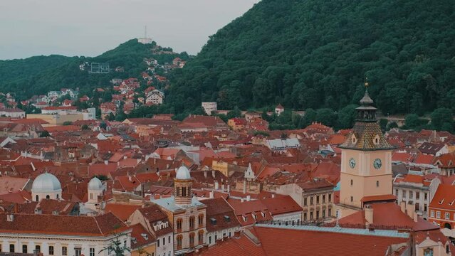 Footage from above of Brasov City in Romania during evening time.